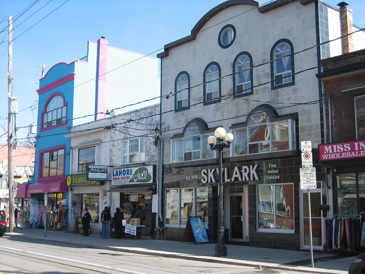 Historic photograph of shopfronts along Gerrard Street East in Toronto’s Little India