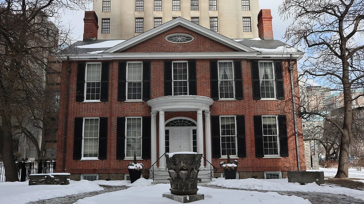 Campbell House brick façade at Queen and University in winter.