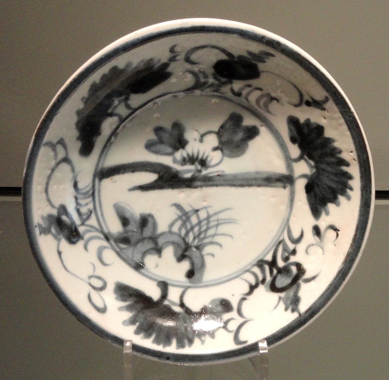 Blue-and-white Arita porcelain dish with a landscape design at the Gardiner Museum.