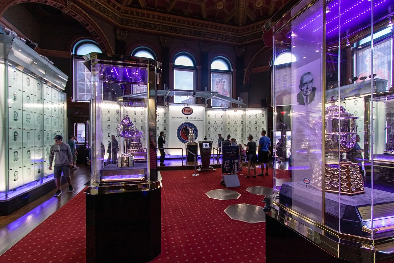 Trophies and player portraits in the Hockey Hall of Fame’s Great Hall.