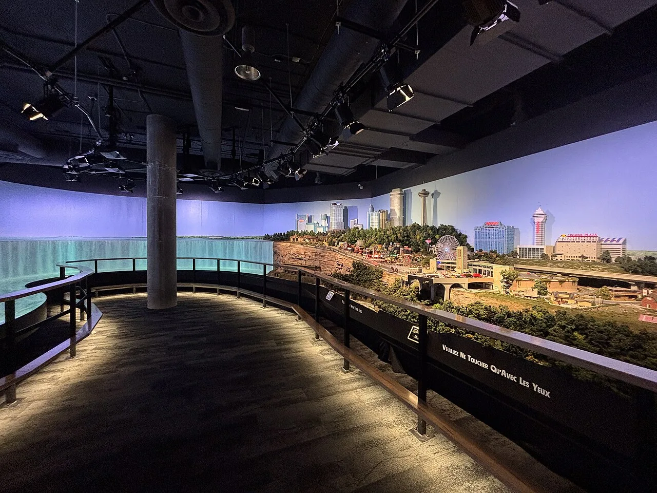 Miniature Niagara Falls and city scenes with a visitor walkway.