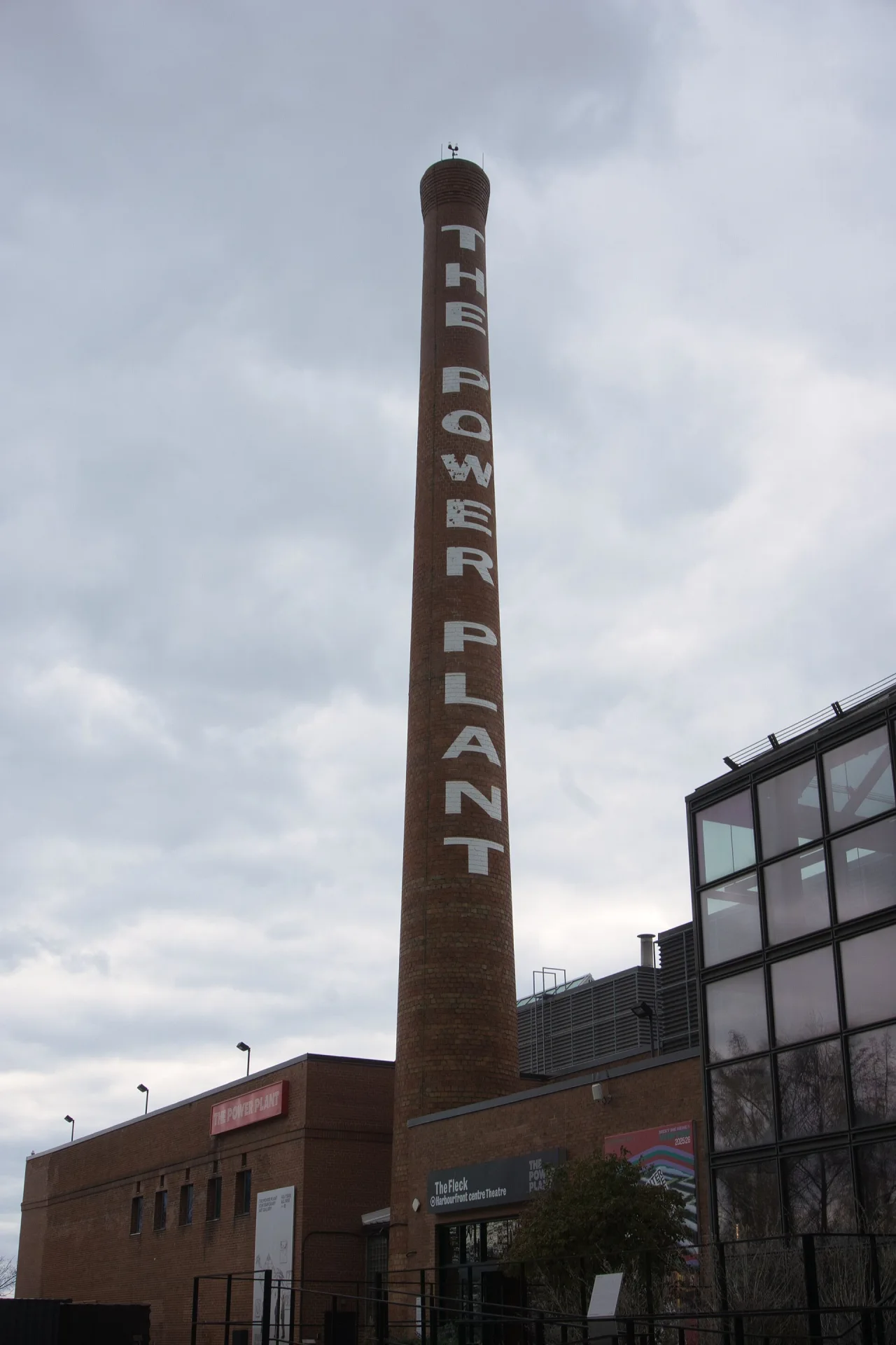 The Power Plant’s named brick smokestack seen from below.