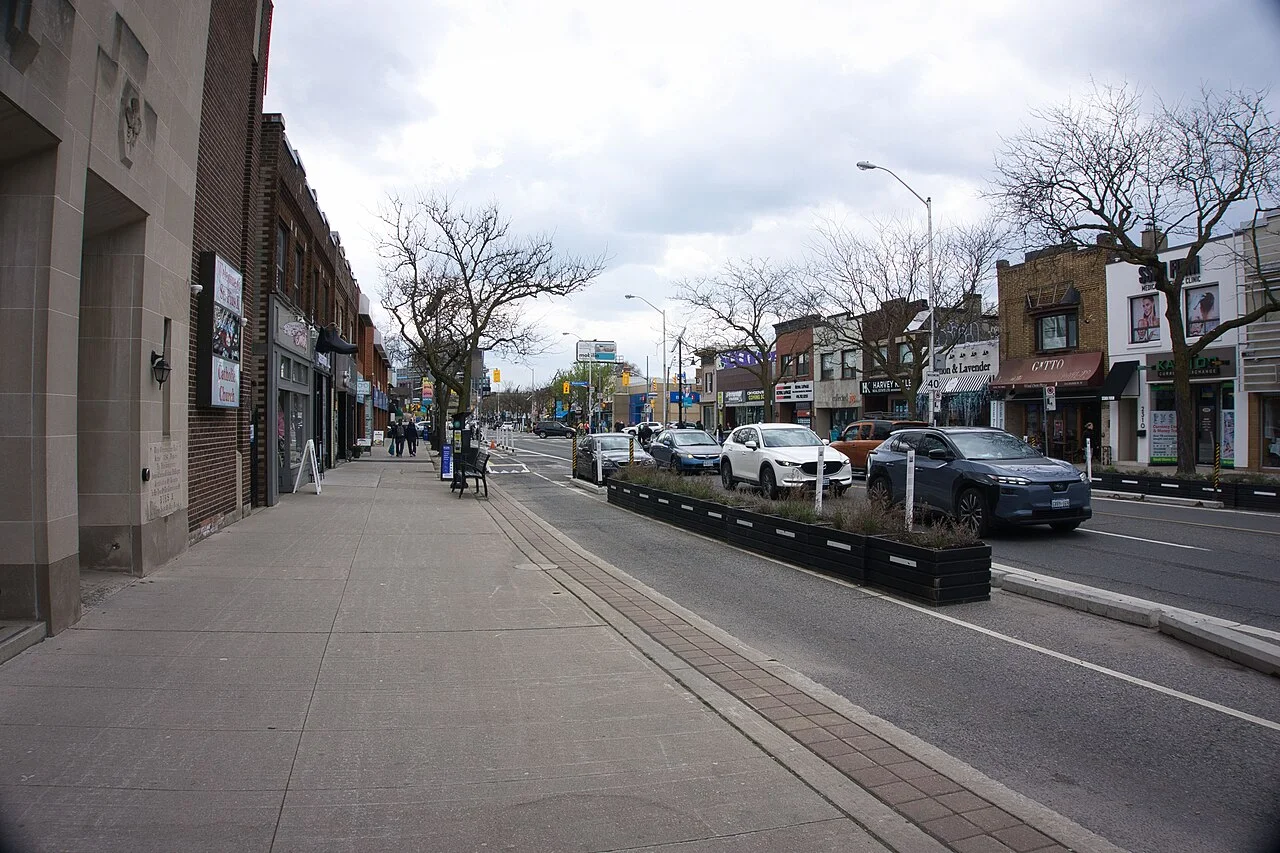 Bloor West Village shopfronts and sidewalk on Bloor Street