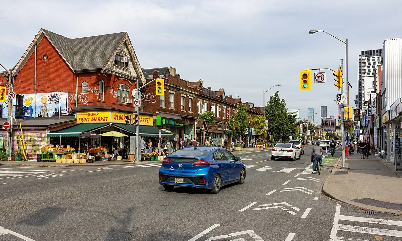 Neighbourhood shopfronts along Bloor Street West in Koreatown