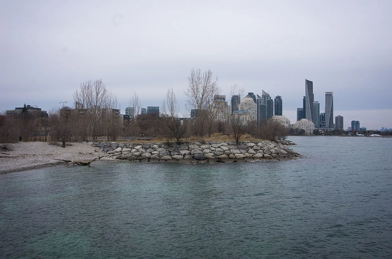 Mimico Waterfront Park shoreline with towers beyond the lakefront