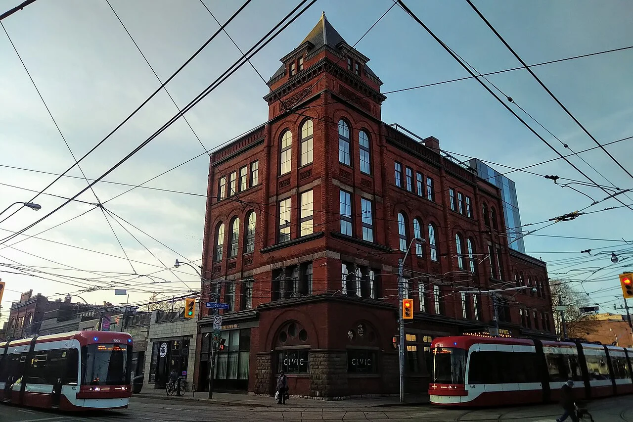 Broadview Hotel with two streetcars at Queen and Broadview