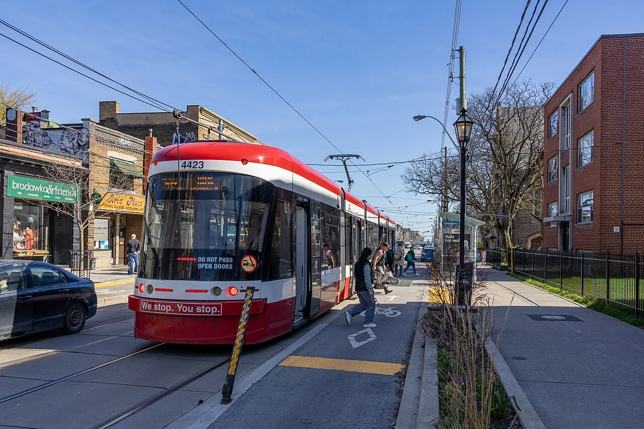 Passengers leaving a 504 King streetcar at Fermanagh Avenue on Roncesvalles