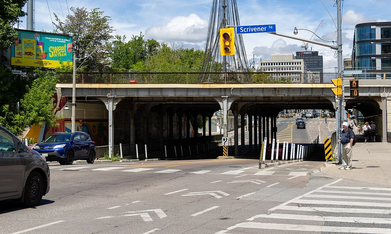 Railway overpass on Yonge Street beside the Scrivener Square intersection