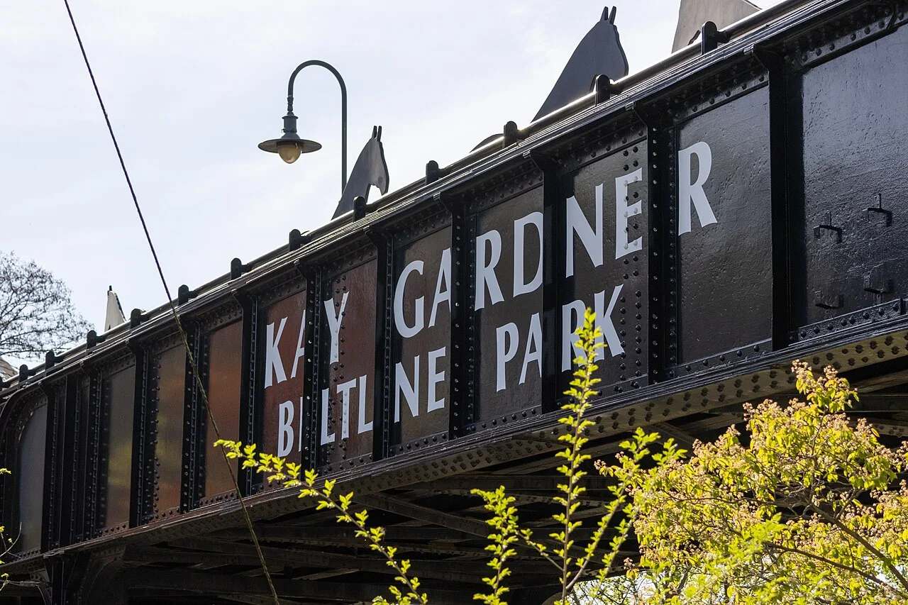The Kay Gardner Beltline Park name on the bridge over Yonge Street.