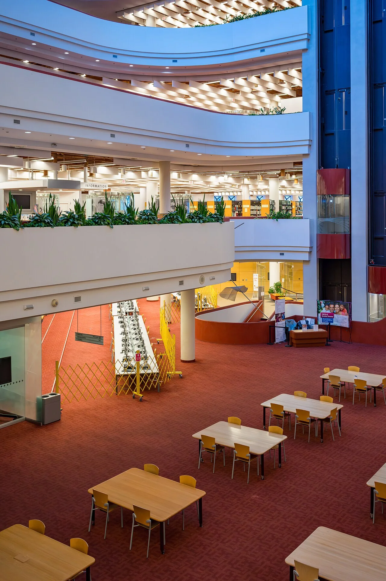 Tables beneath the open atrium at Toronto Reference Library.
