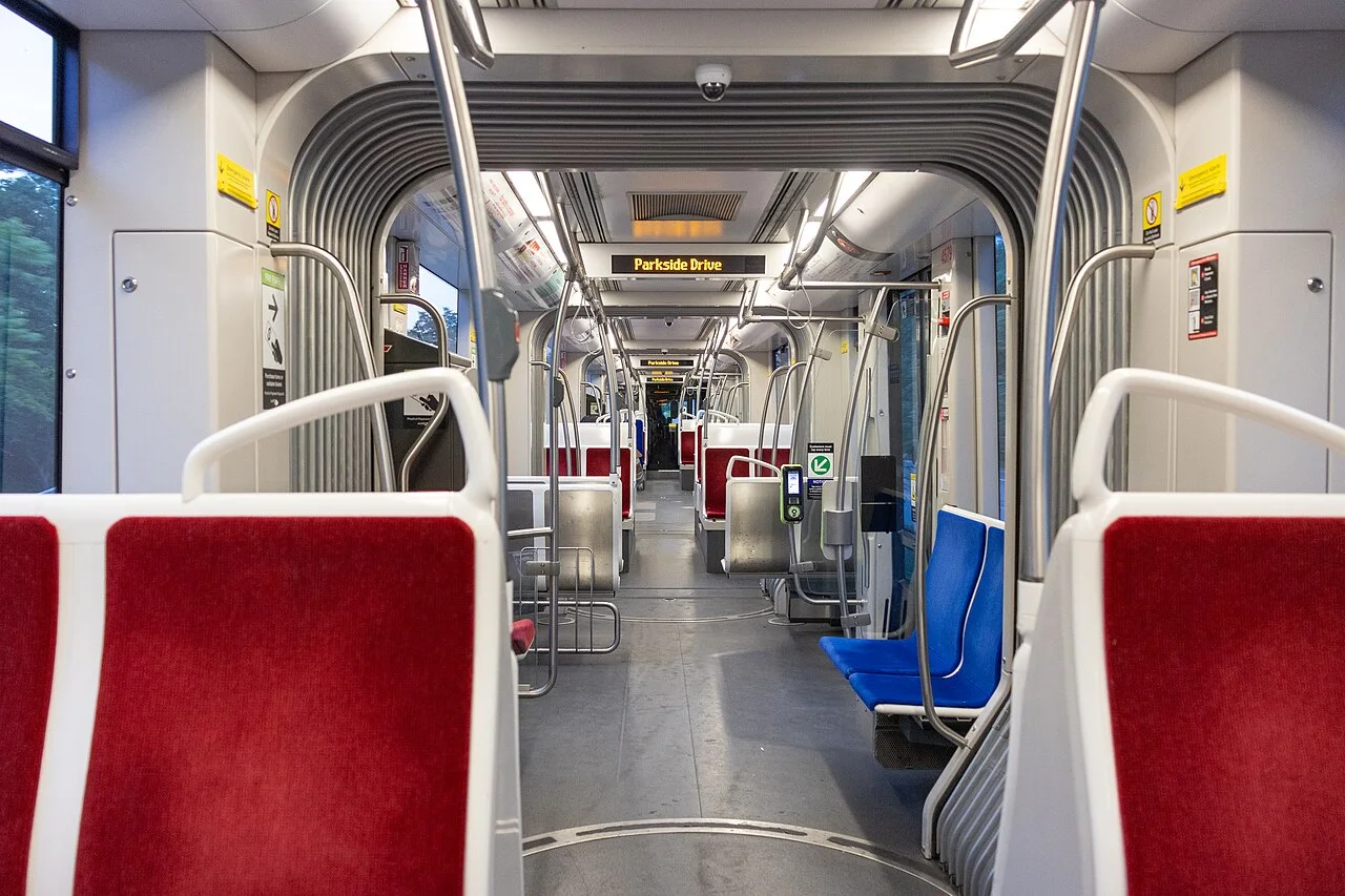 The aisle and seating inside a modern TTC streetcar.