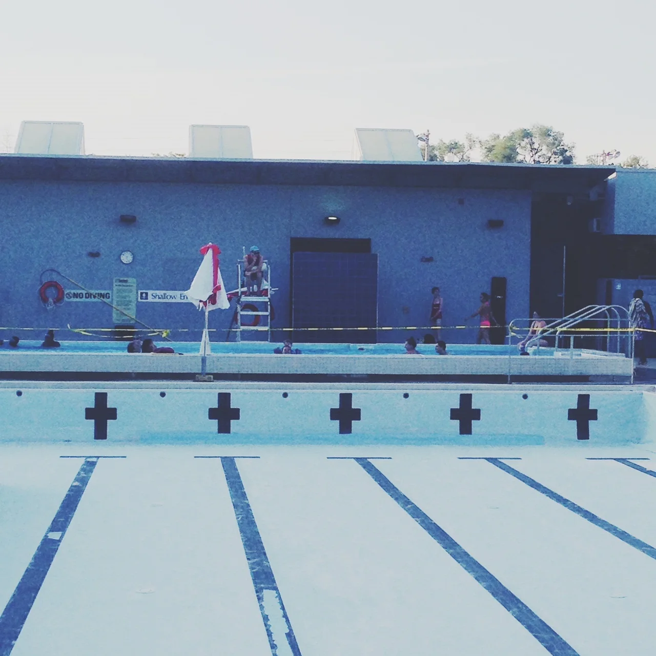 Swimmers in the outdoor Alex Duff Memorial Pool.