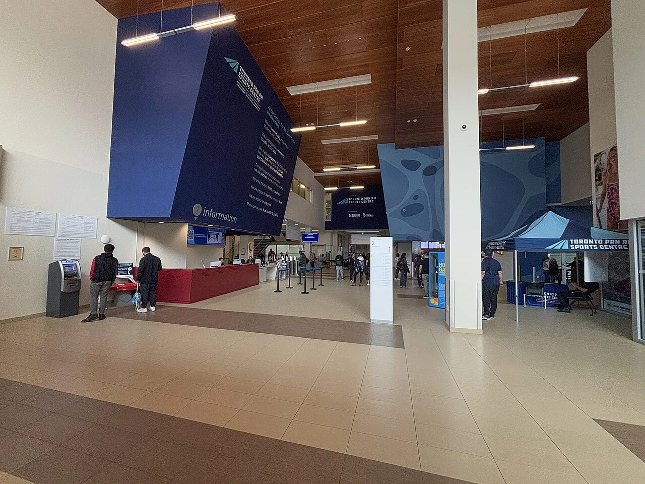 Customer-service desks in the Toronto Pan Am Sports Centre lobby.