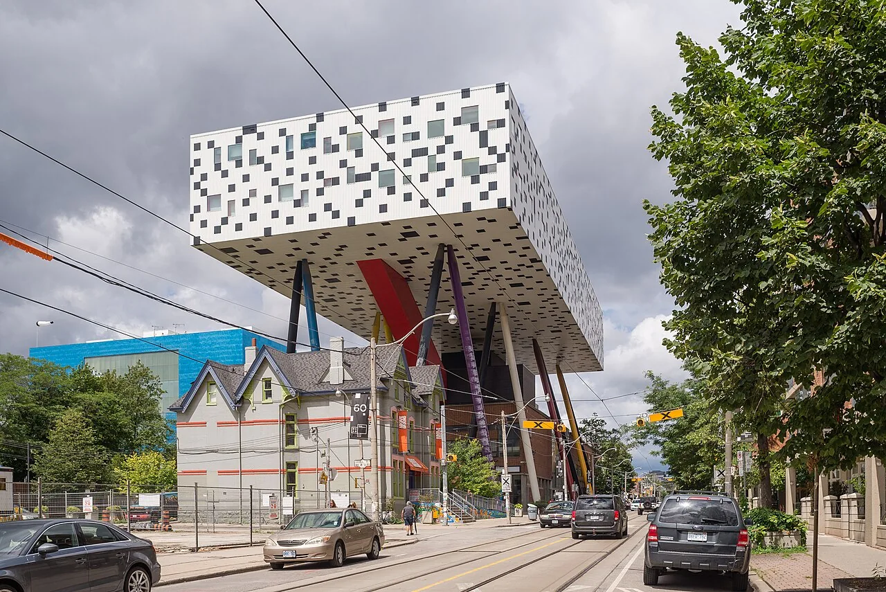 The black-and-white Sharp Centre for Design raised on colourful columns above McCaul Street.